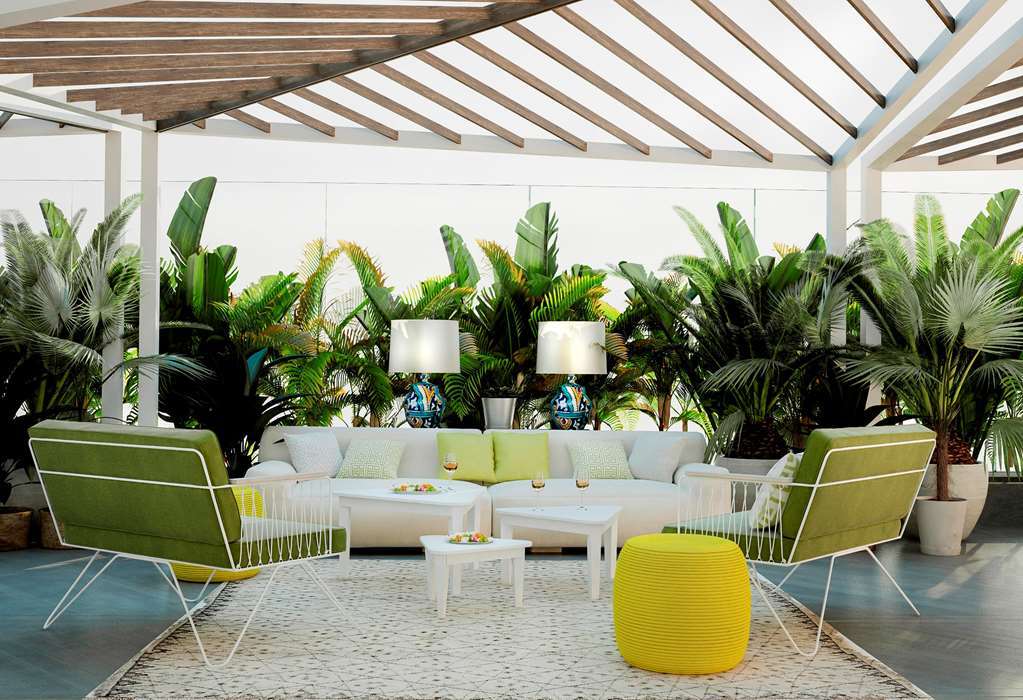 Hilton Tanger City Center Tânger Restaurante foto The interior of the hotel